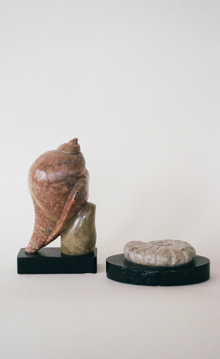 A Pair of Contemporary Sculptural Stone Seashell Motifs