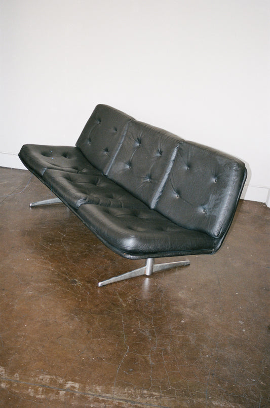 Vintage Tufted Black Sofa with Chrome Base