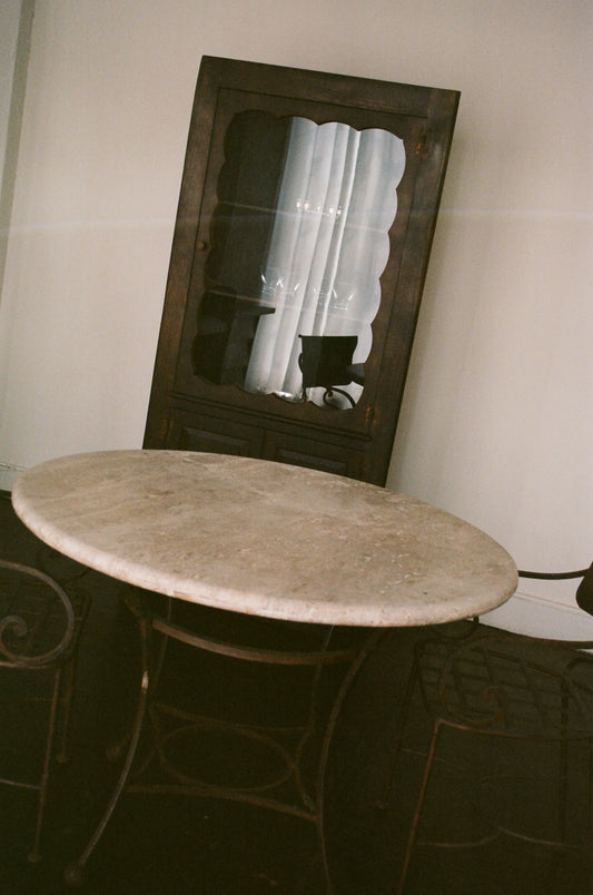 Round Cream Travertine Dining Table with Metal Base
