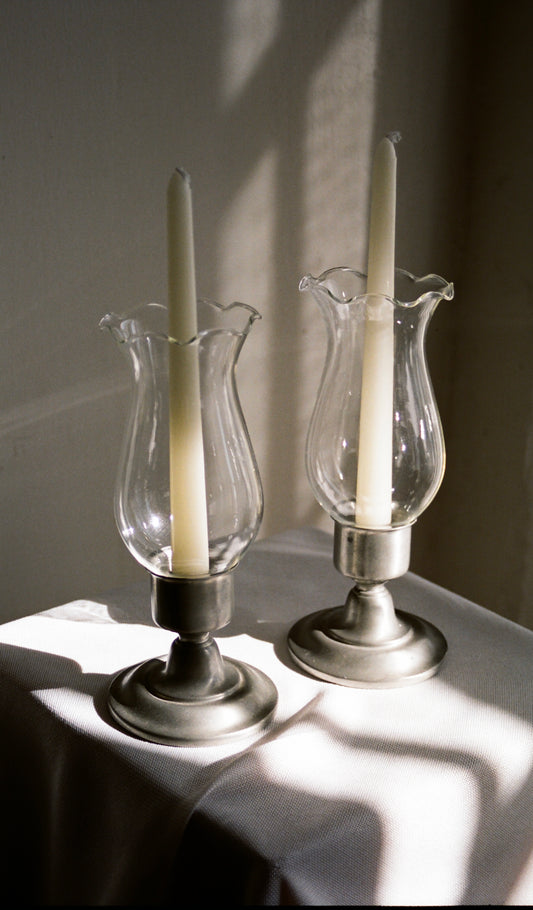 A Pair of Pewter Candlestick Holders